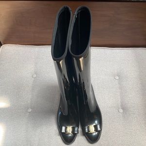 Women's Black Tall Rain Boots with bow accent.